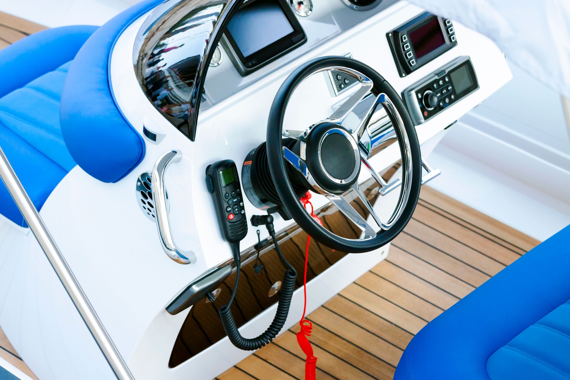 Closeup modern speed boat cockpit control panel with CB radio